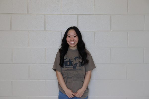 Headshot of Abby Tang. She challenges Design Club members to expand their creativity by creating fun and unique activities. 