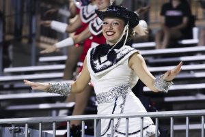 Emma Parnell dances alongside the Cavellettes at the Tompkins vs Paetow game.